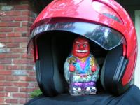 Glitter Tengu sheltering in helmet!